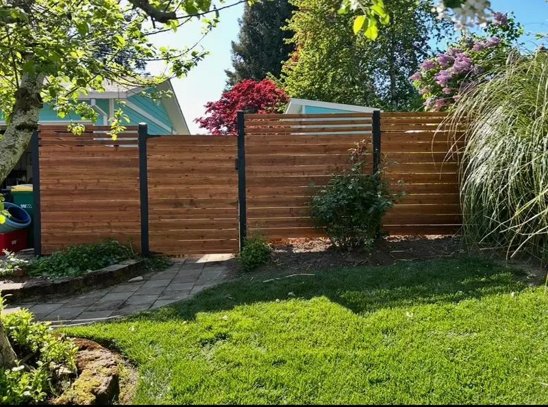 Wood fence with gate installed by All City Exteriors LLC